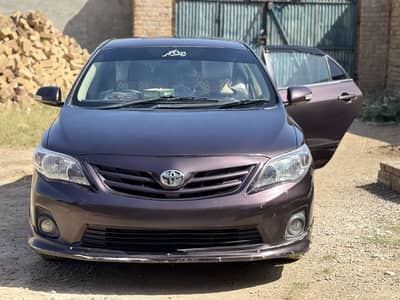 Toyota Gli 2012 Model Islamabad Register Redwine Colour For Sale