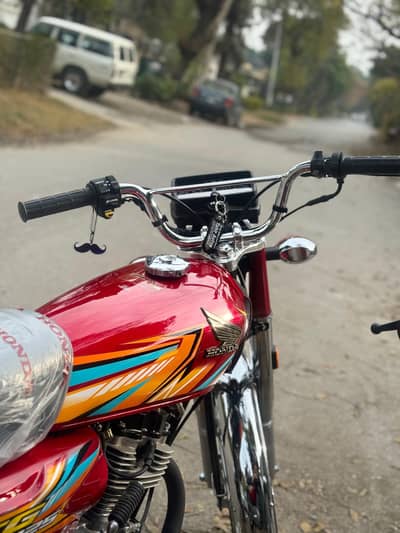 Honda 125 red colour 2026; model for sale Islamabad number