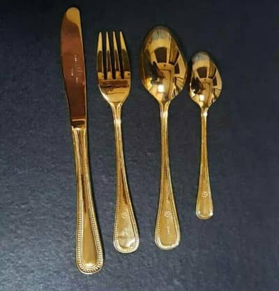 Gold plated cutlery set.