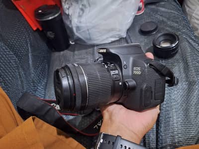 Canon 700D with 18.55 STM lens or canon 50mm lens
