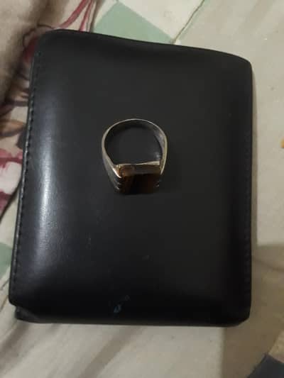 Tiger stone with silver