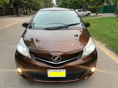 Toyota Vitz chocolate brown 2011 model, 2014 import.