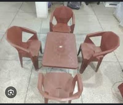 Plastic Chairs with Matching Table – Good Condition