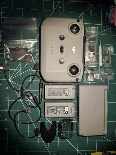 DJI Mini Series - Remote, Batteries, Charging Dock etc. Used 8/10.