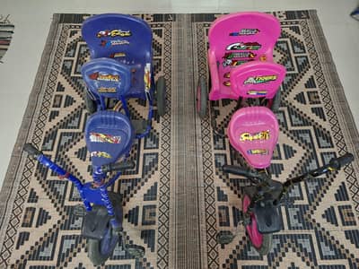 Two cycles blue and pink