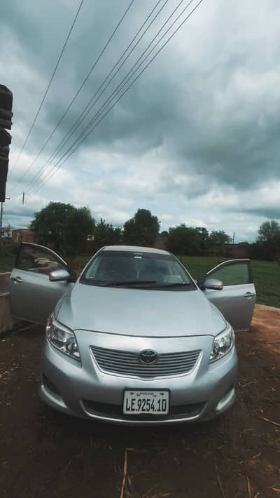 Toyota Corolla GLi 2010 – Silver (For Sale)