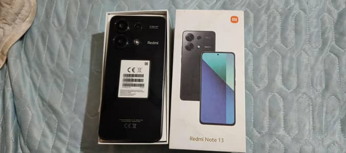 redmi note 13 one hand use