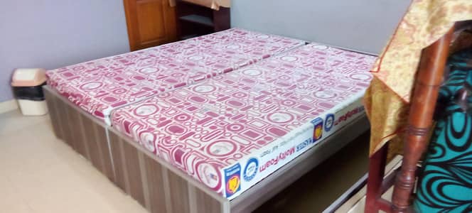 2 single  beds with mattress