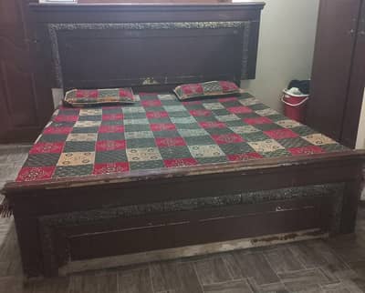 wooden bed with 2 side tables