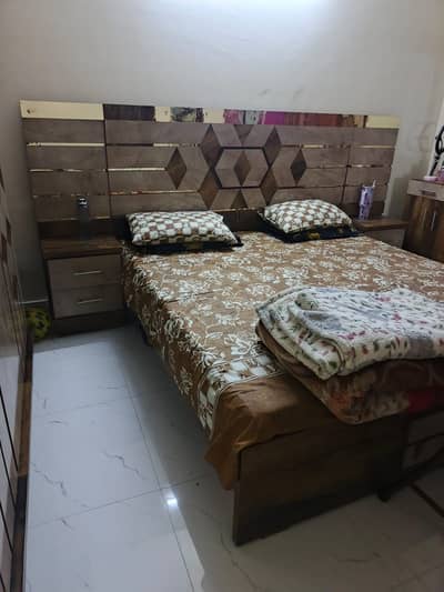 Bed set with long mirror and puffy chairs