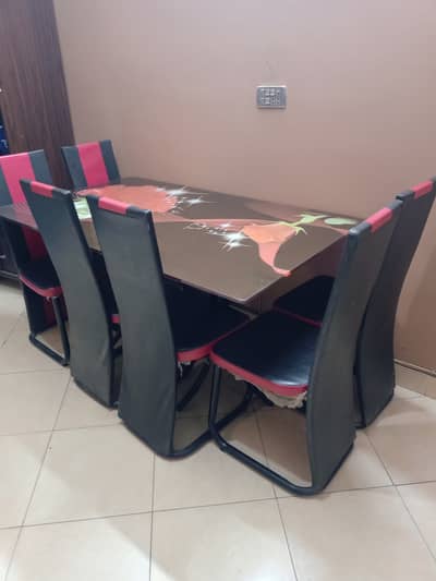Glass table with 6 six chairs are ready for sale (Black theme)