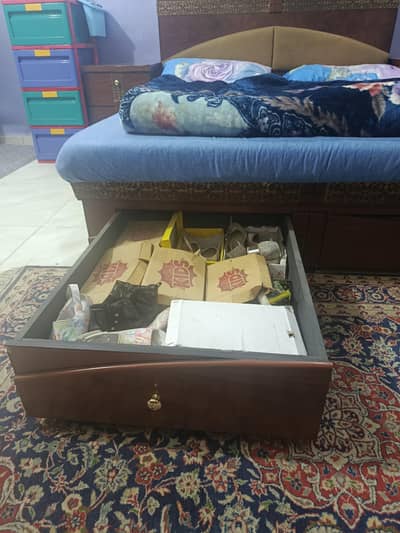 bed with 2 large storage drawers on front