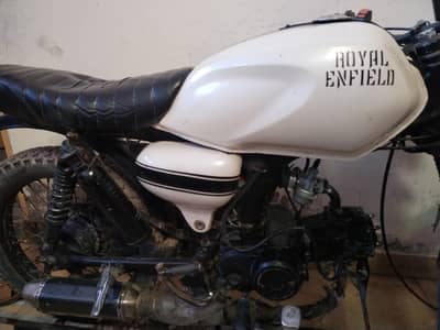 converted to cafe racer (70 cc)