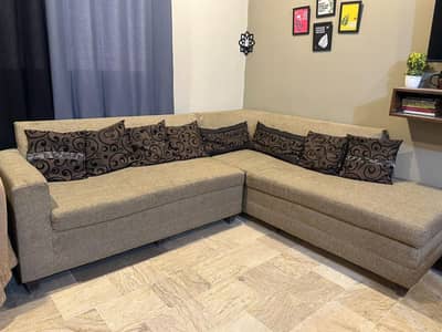 L Shaped Sofa with Table.