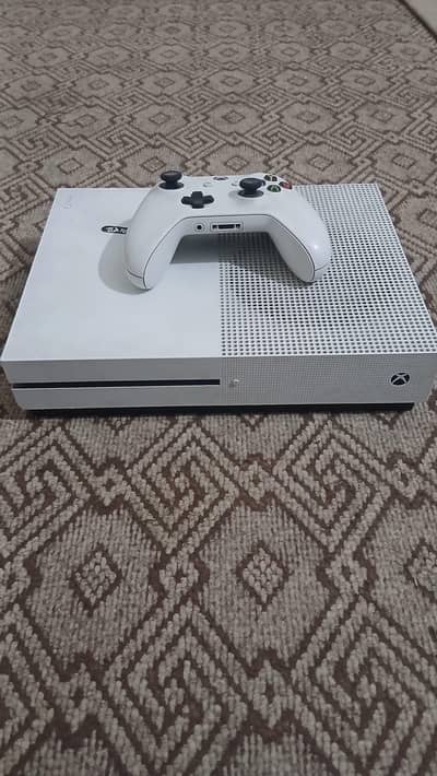 Read ad. xbox one s 500 gb with original controller and games for sale