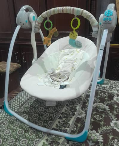Electric baby swing