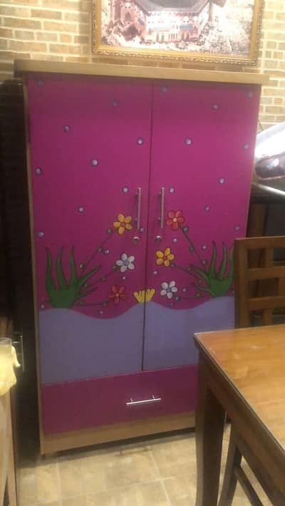 selling a wooden kids  wardrobe