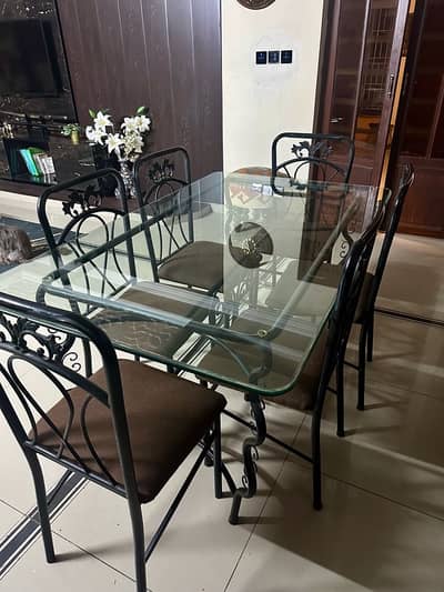 Glass top dining table