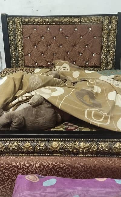 iron ka big duble bed ha ful new with steel sheet  under matres