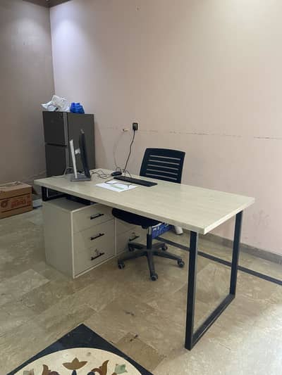 Office table with attached drawer cupboard with office chair