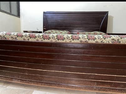 Bed with side tables and mattress