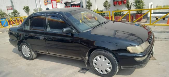 corrola 2000 model just fresh look sides showed