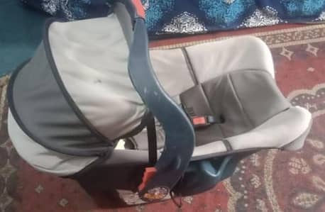 Baby car seat/ carry cot