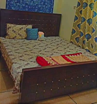 Wooden bed with new mattress for sale