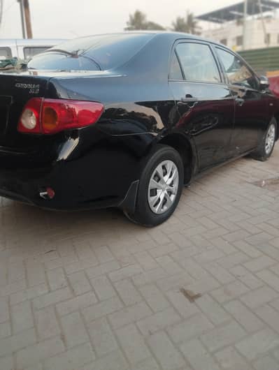 Toyota Corolla Xli Model 2010 convert Gli Black Color
