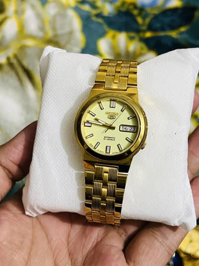 Seiko 5 7s26 glass back model golden