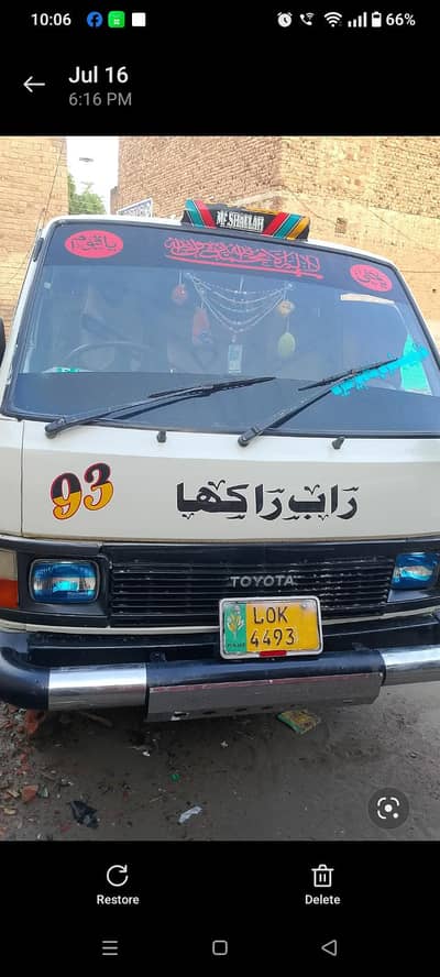 1986 white colour Toyota highroof