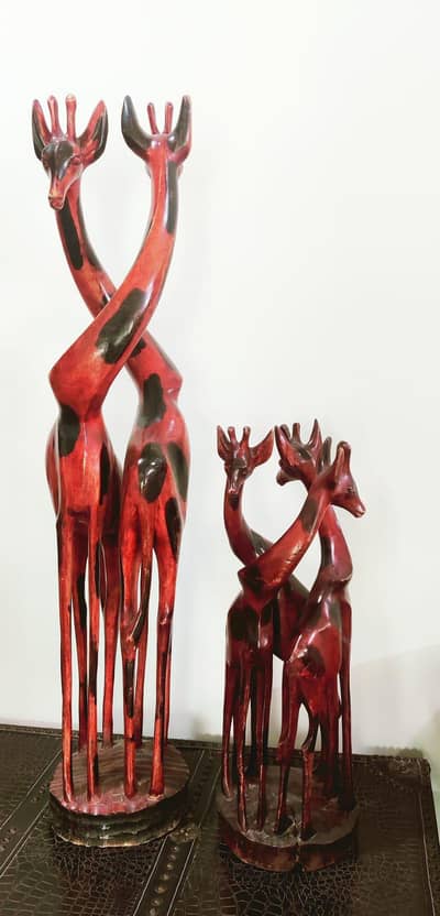 Giraffe sculptures and Shoes Rack