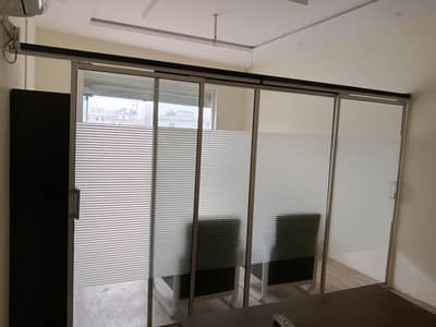 glass partition and sofa