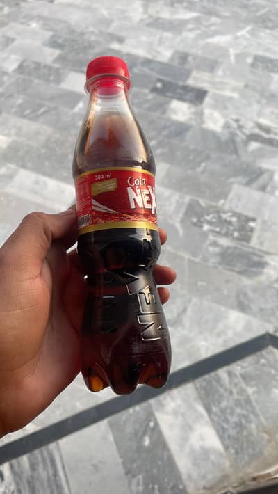 Cola Next 300ml available 400 pets