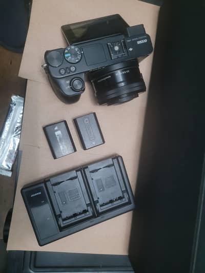 sony a6500 with kit lens 16x50 2 battery and dual charger
