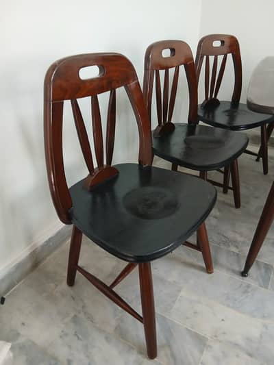 Dinning Table with 8 wooden chairs with cussions