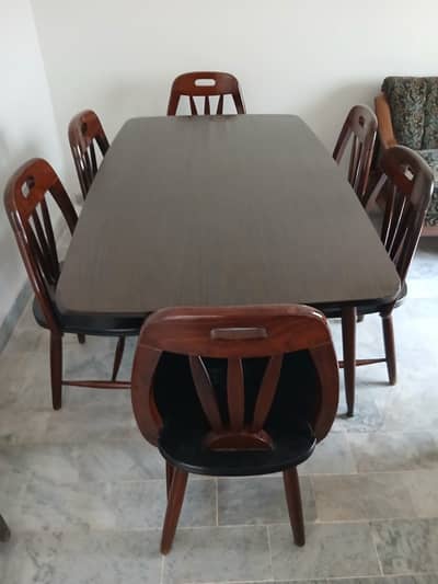 Dinning Table with 8 wooden chairs with cussions