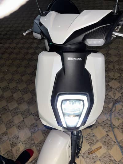 Honda icon e with golden no