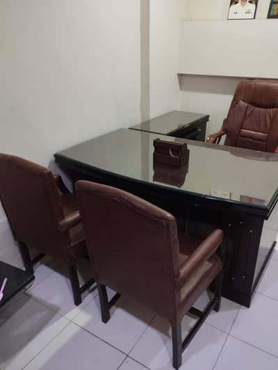 Office Table, Chairs, side table and Boss chair.
