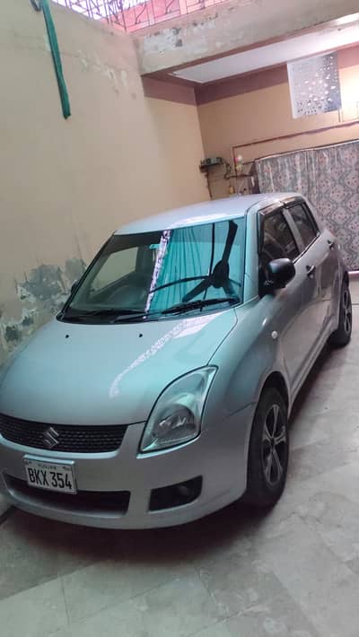 Suzuki Swift DX 1.3 – 2012 (Manual)
