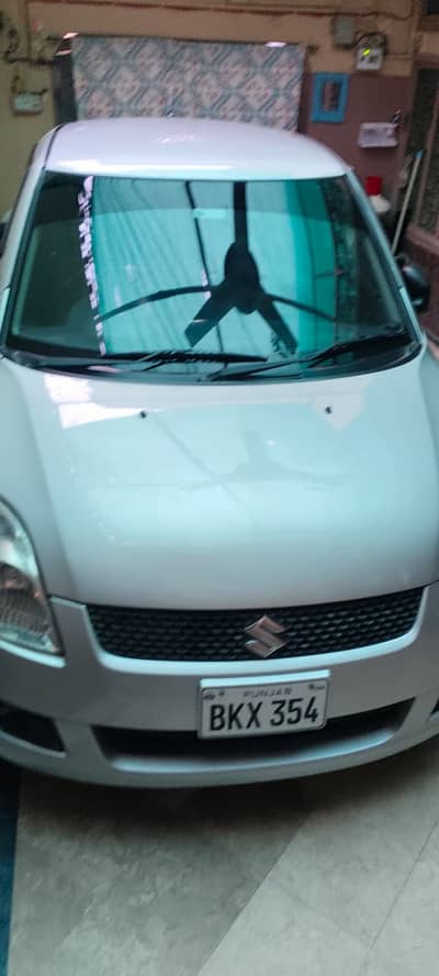 Suzuki Swift DX 1.3 – 2012 (Manual)