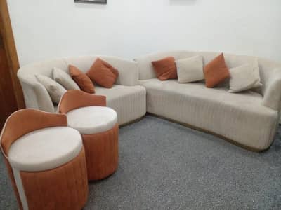 creamy white and orange sofas set