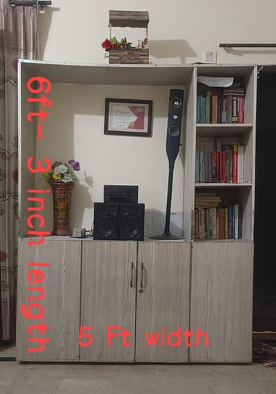 wooden entertainment center and bookshelf unit
