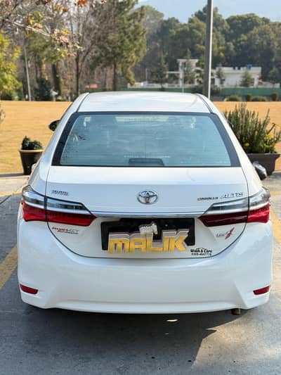 Toyota Corolla Altis 1.6 White Genuine