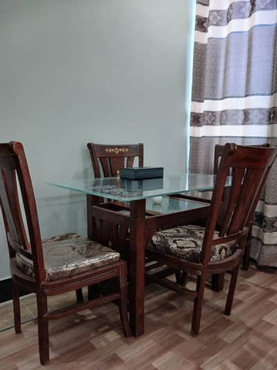 4 seater glass top wooden dining table for sale
