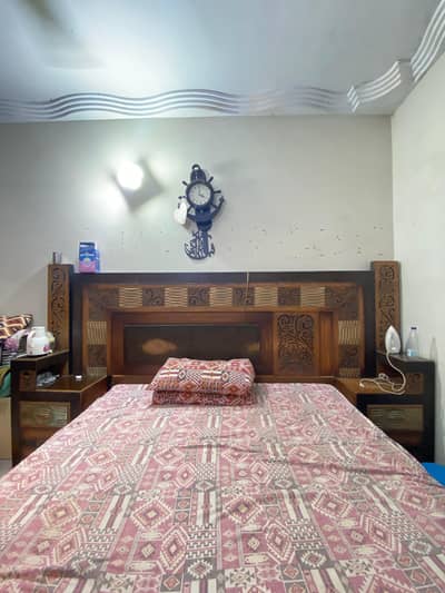 Bed with side tables