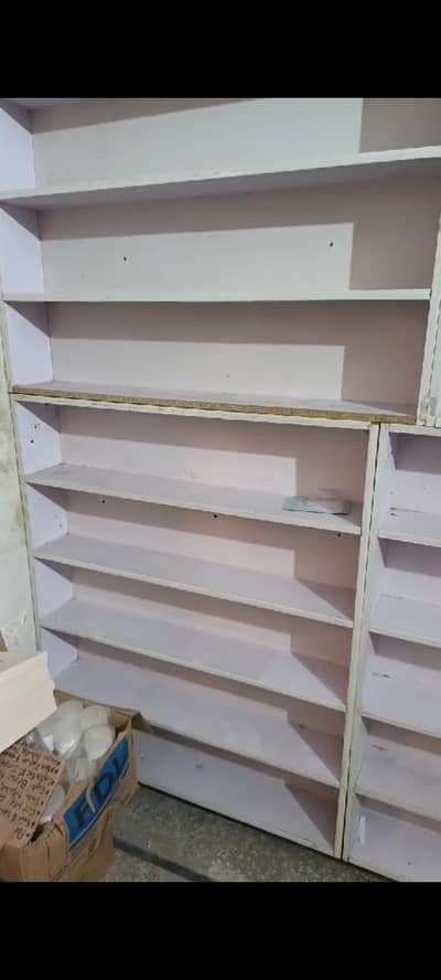 04 peices wooden rackes shelves for shop office etc good condition