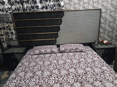 bed with side table and dressing