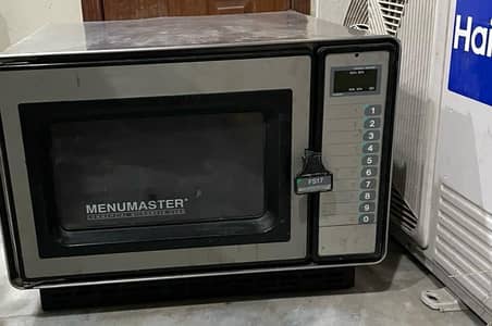 microwave, meat cutter and vacuum sealer