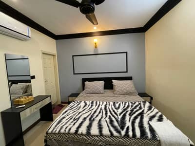 One bed apartment per day available Gulbarga green Islamabad